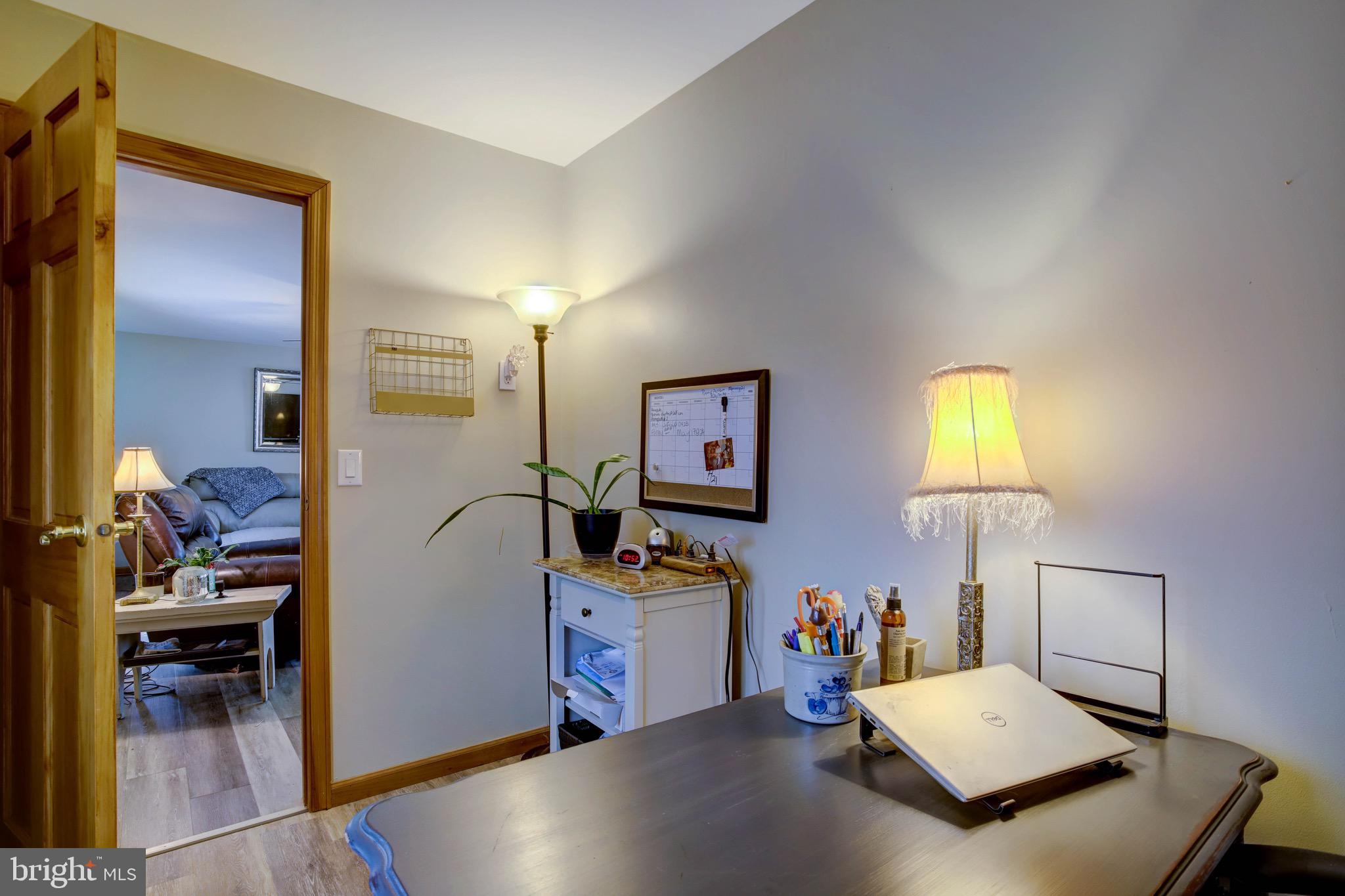 5520 Indiantown Road Rhodesdale, MD 21659 - Photo 27 of 51 a view of a workspace with furniture and bedroom view