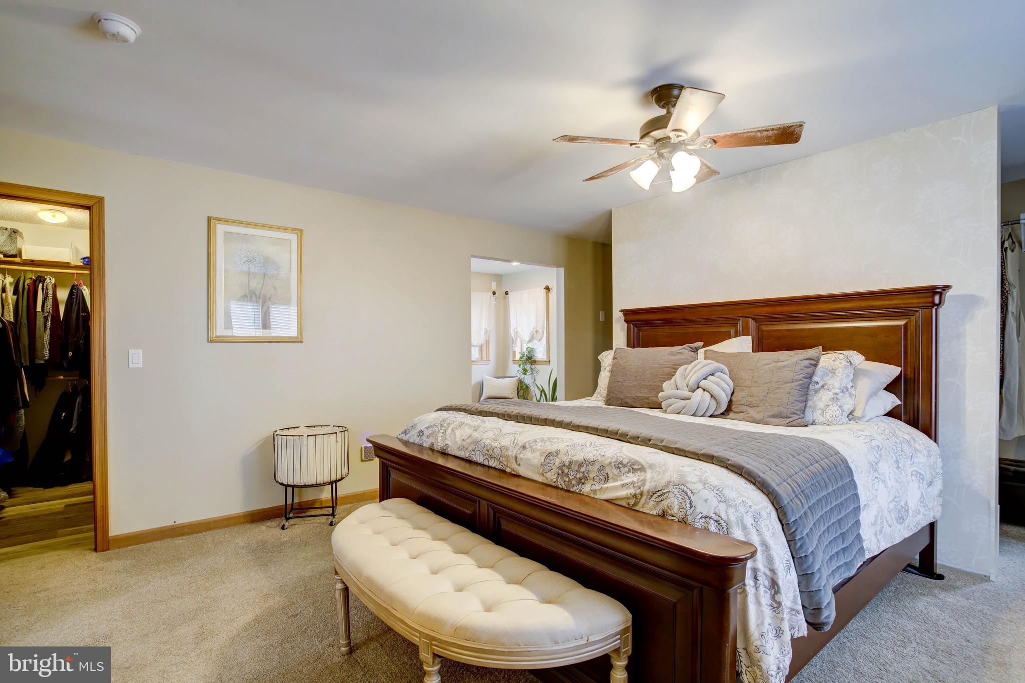 5520 Indiantown Road Rhodesdale, MD 21659 - Photo 30 of 51 a bedroom with a bed and a ceiling fan