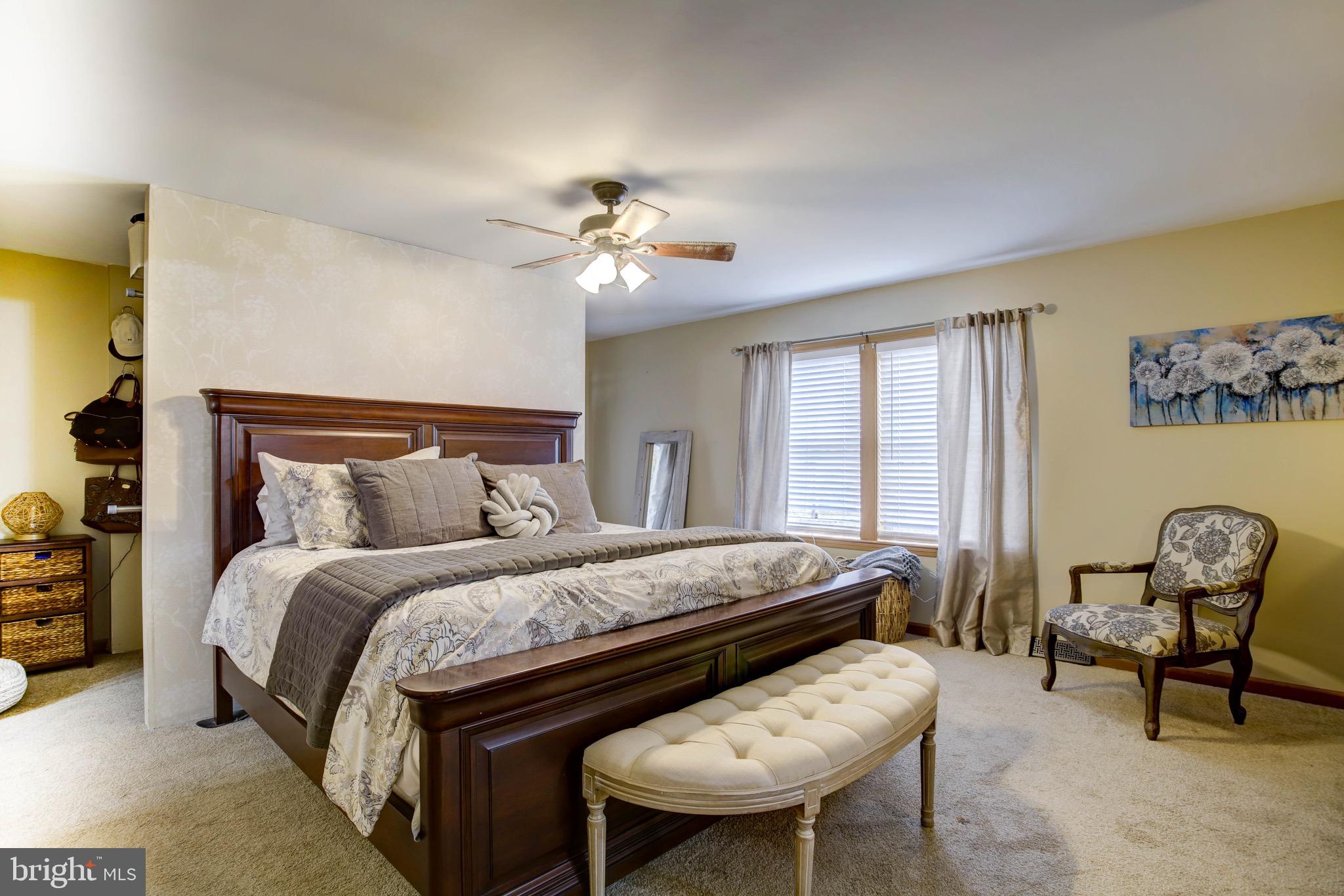 5520 Indiantown Road Rhodesdale, MD 21659 - Photo 33 of 51 a bed room with a bed and a chair