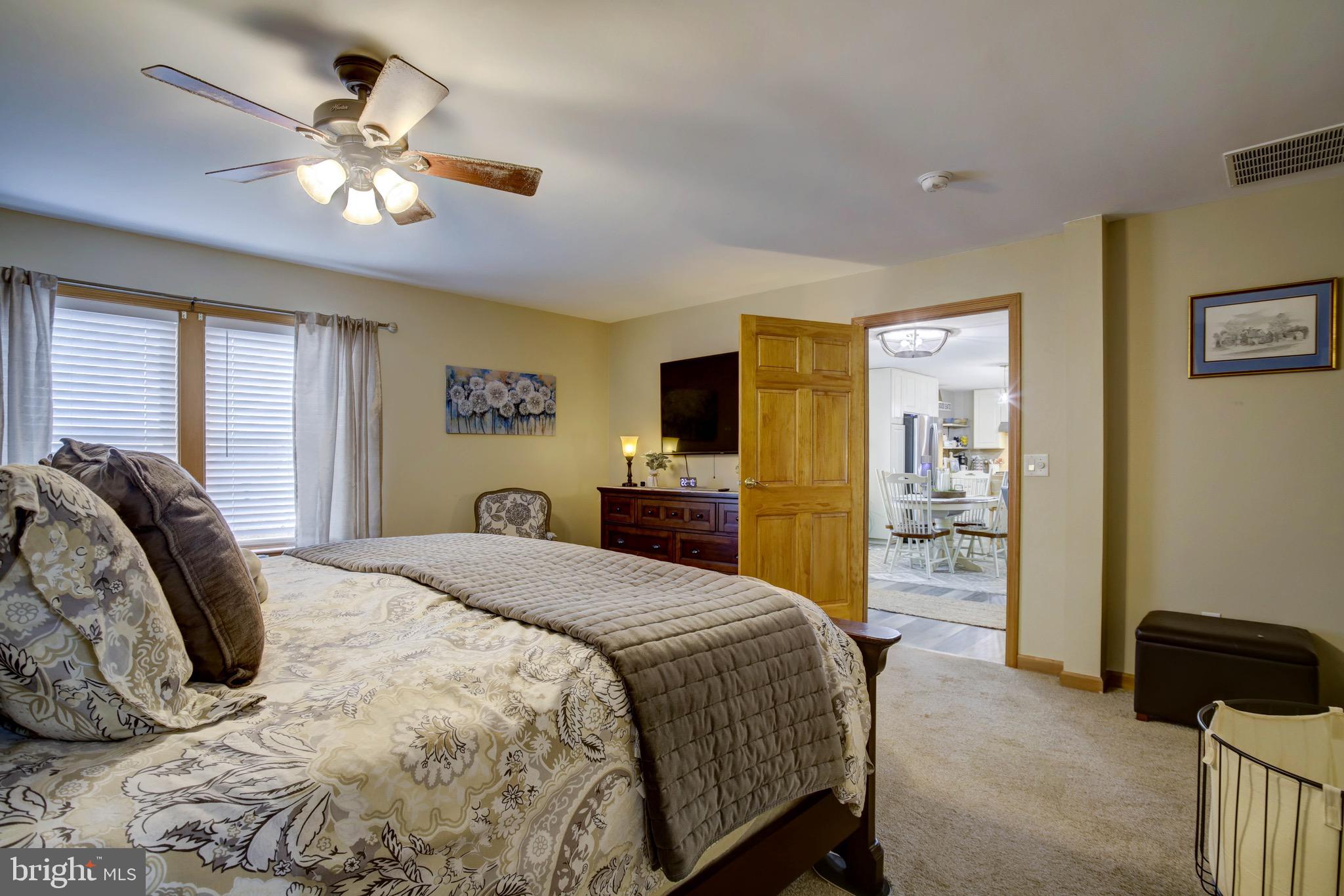 5520 Indiantown Road Rhodesdale, MD 21659 - Photo 34 of 51 a spacious bedroom with a bed and a walk in closet