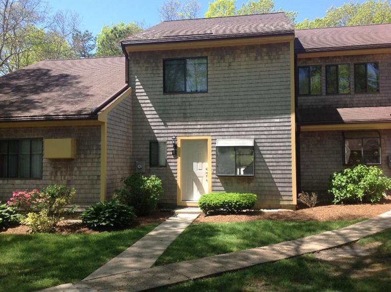 11 Round House Road, Unit 11 Bourne, MA 02532 - Photo 1 of 23 a view of a house with a yard