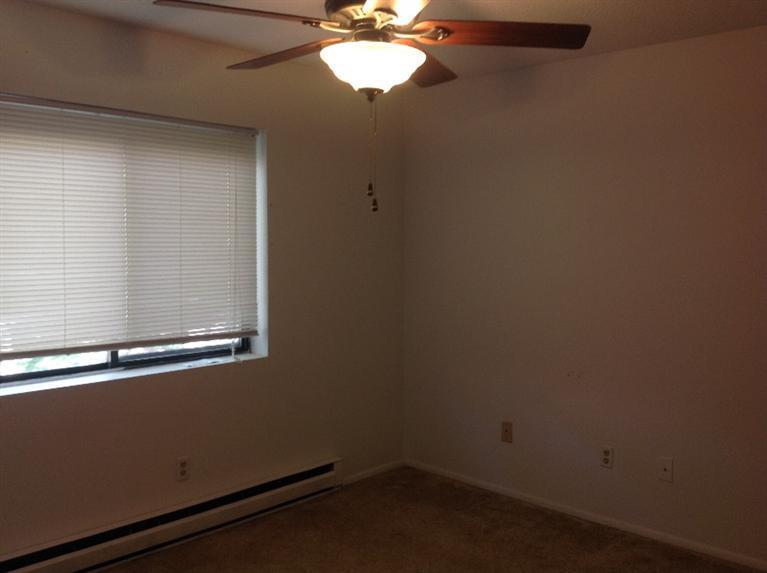 11 Round House Road, Unit 11 Bourne, MA 02532 - Photo 12 of 23 an empty room with a window