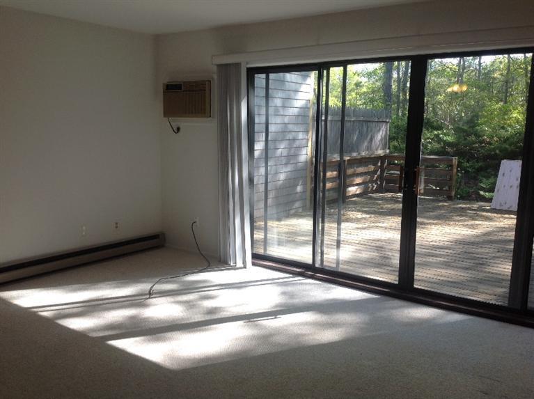 11 Round House Road, Unit 11 Bourne, MA 02532 - Photo 16 of 23 a view of empty room with floor to ceiling window