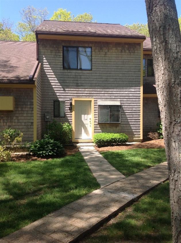11 Round House Road, Unit 11 Bourne, MA 02532 - Photo 17 of 23 a front view of a house with garden