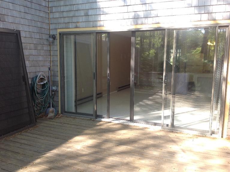 11 Round House Road, Unit 11 Bourne, MA 02532 - Photo 21 of 23 a view of a glass door of the house