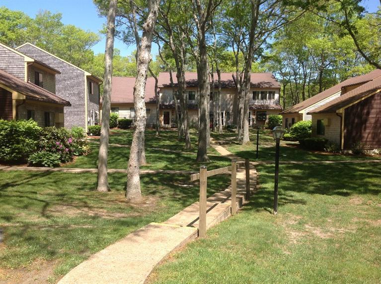 11 Round House Road, Unit 11 Bourne, MA 02532 - Photo 3 of 23 a view of residential houses with outdoor space