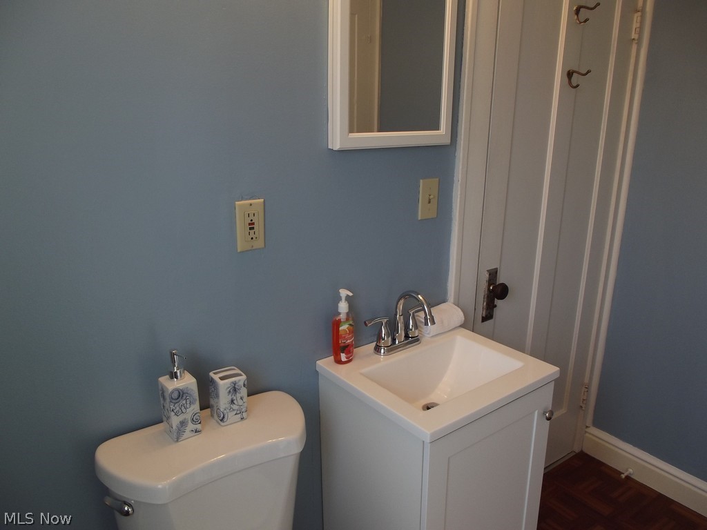 3363 Berea Road Cleveland, OH 44111 - Photo 31 of 50 Bathroom featuring toilet, parquet flooring, and vanity