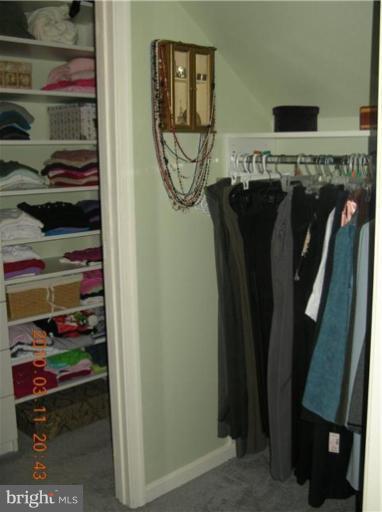 8258 Sycamore Road Lusby, MD 20657 - Photo 16 of 24 a view of walk in closet