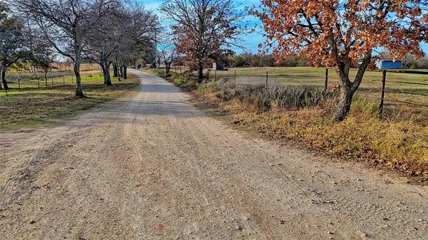 a view of backyard with green space