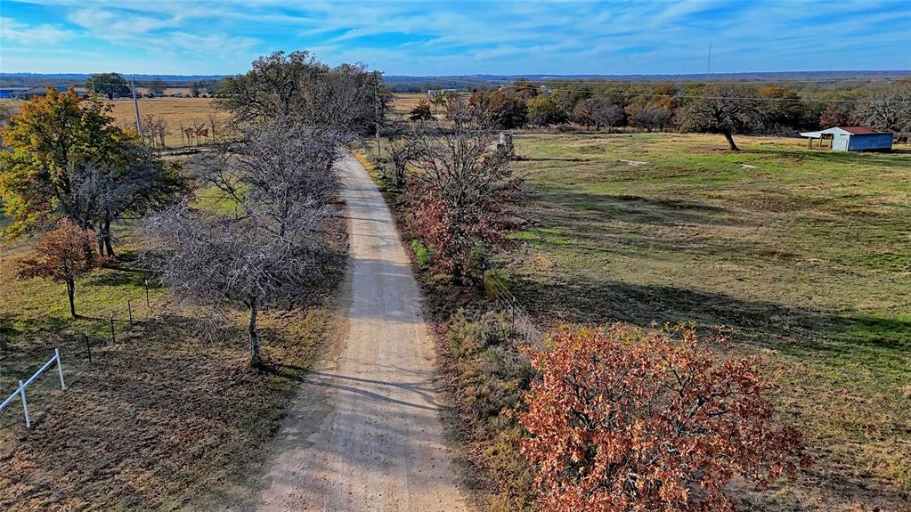 0 Carminati Road Montague, TX 76251 - Photo 25 of 39 a view of a yard with an ocean view
