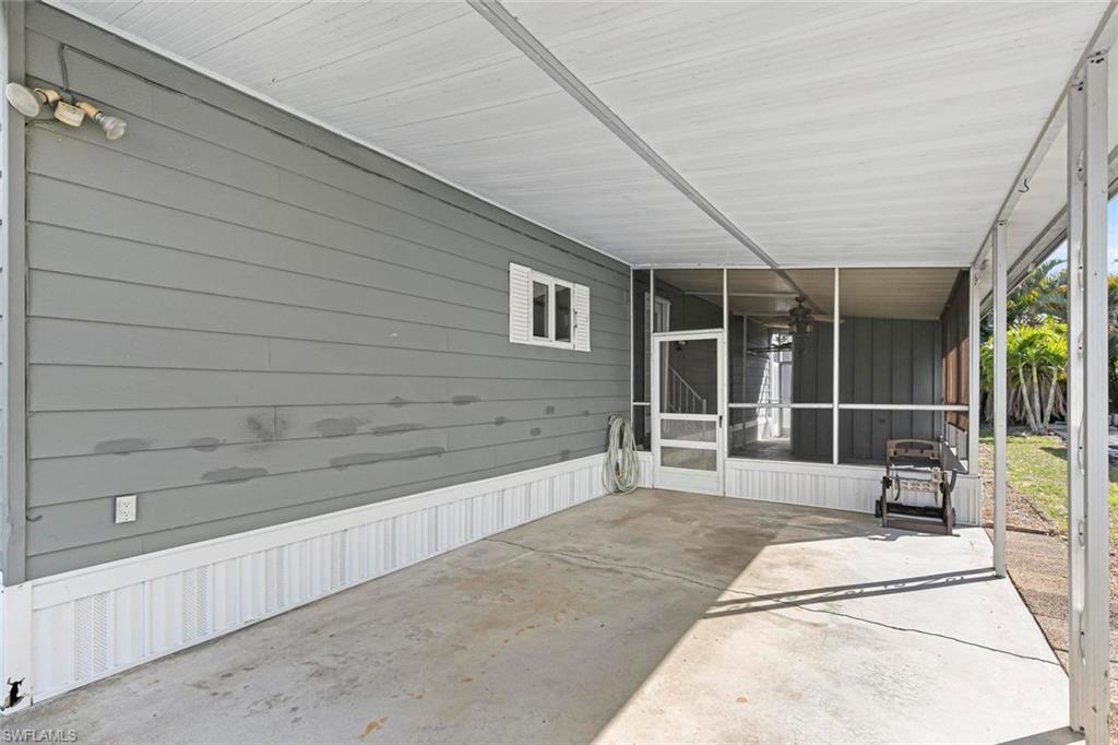 209 Rookery Road Naples, FL 34114 - Photo 33 of 41 Carport