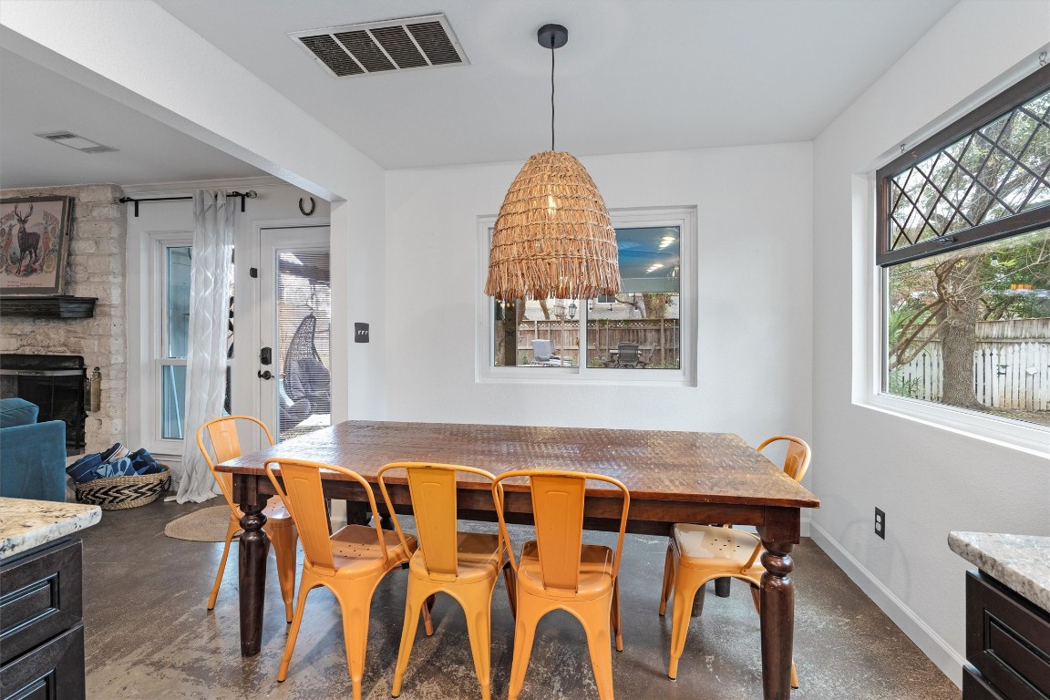 1808 Chincoteague Way Round Rock, TX 78681 - Photo 14 of 40 a very nice looking dining room with a table and chairs
