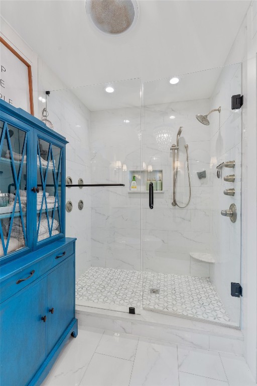 1808 Chincoteague Way Round Rock, TX 78681 - Photo 20 of 40 a bathroom with a glass shower door
