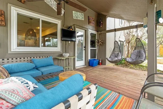 a view of swimming pool with a patio and wooden floor