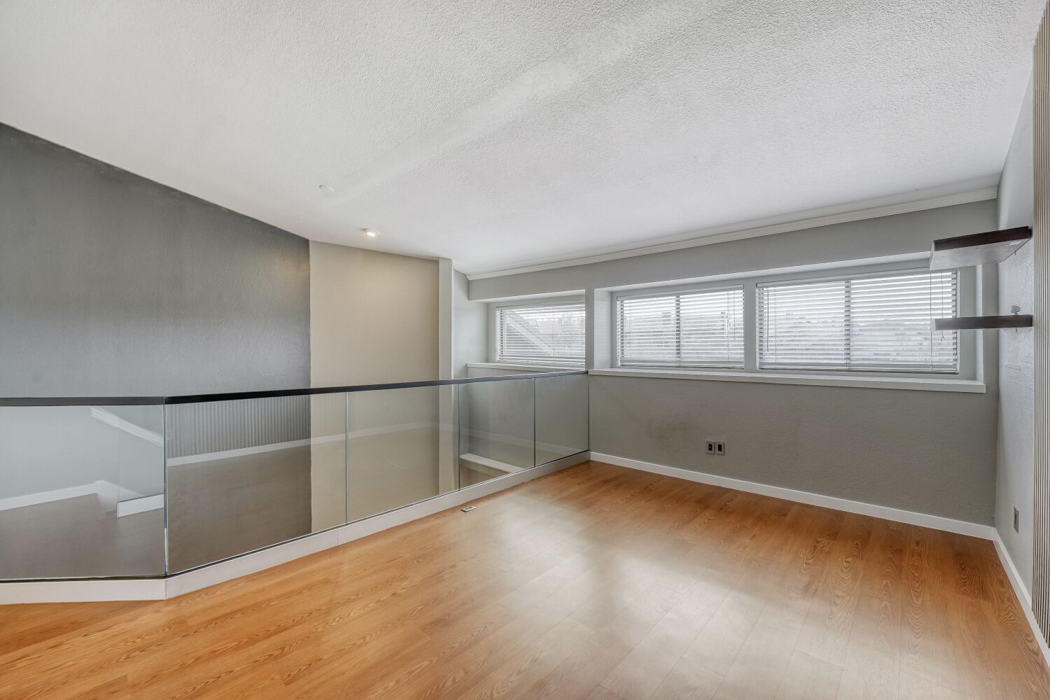 8200 Neely Drive, Unit 214 Austin, TX 78759 - Photo 11 of 19 a view of an empty room with a window