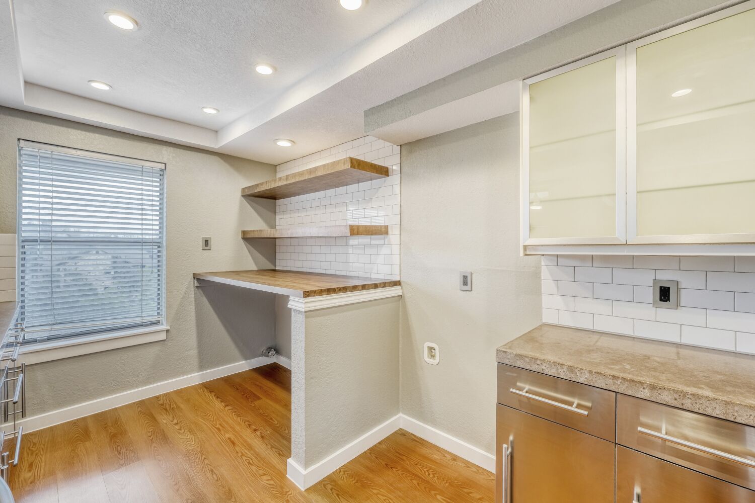 8200 Neely Drive, Unit 214 Austin, TX 78759 - Photo 6 of 19 a kitchen with a sink cabinets and a window