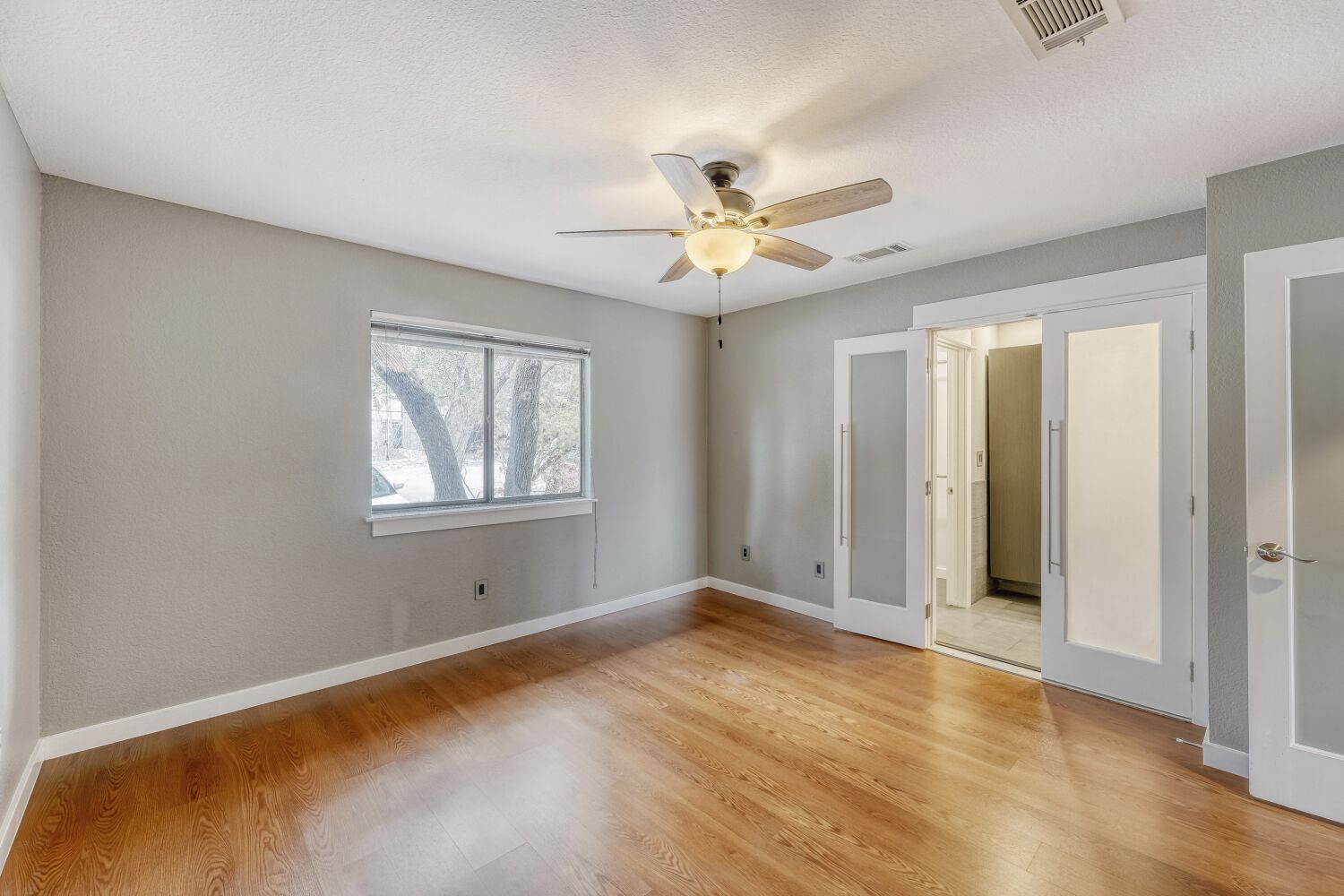 8200 Neely Drive, Unit 214 Austin, TX 78759 - Photo 7 of 19 a view of empty room with window