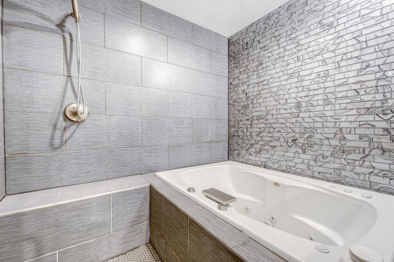 8200 Neely Drive, Unit 214 Austin, TX 78759 - Photo 10 of 19 a bathroom with a bathtub and shower