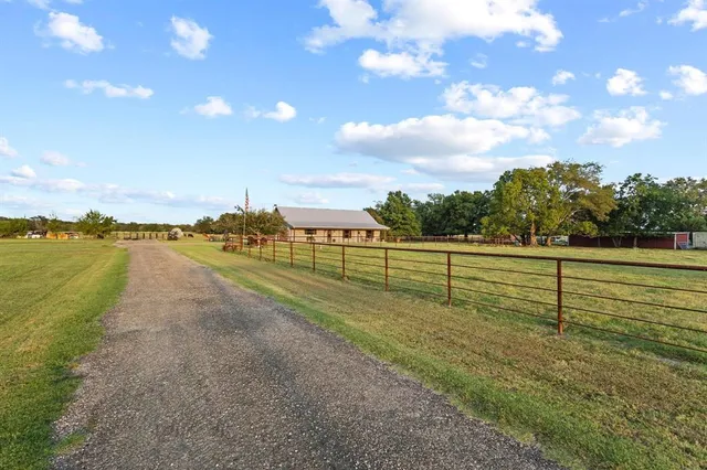 a view of a lake with a big yard