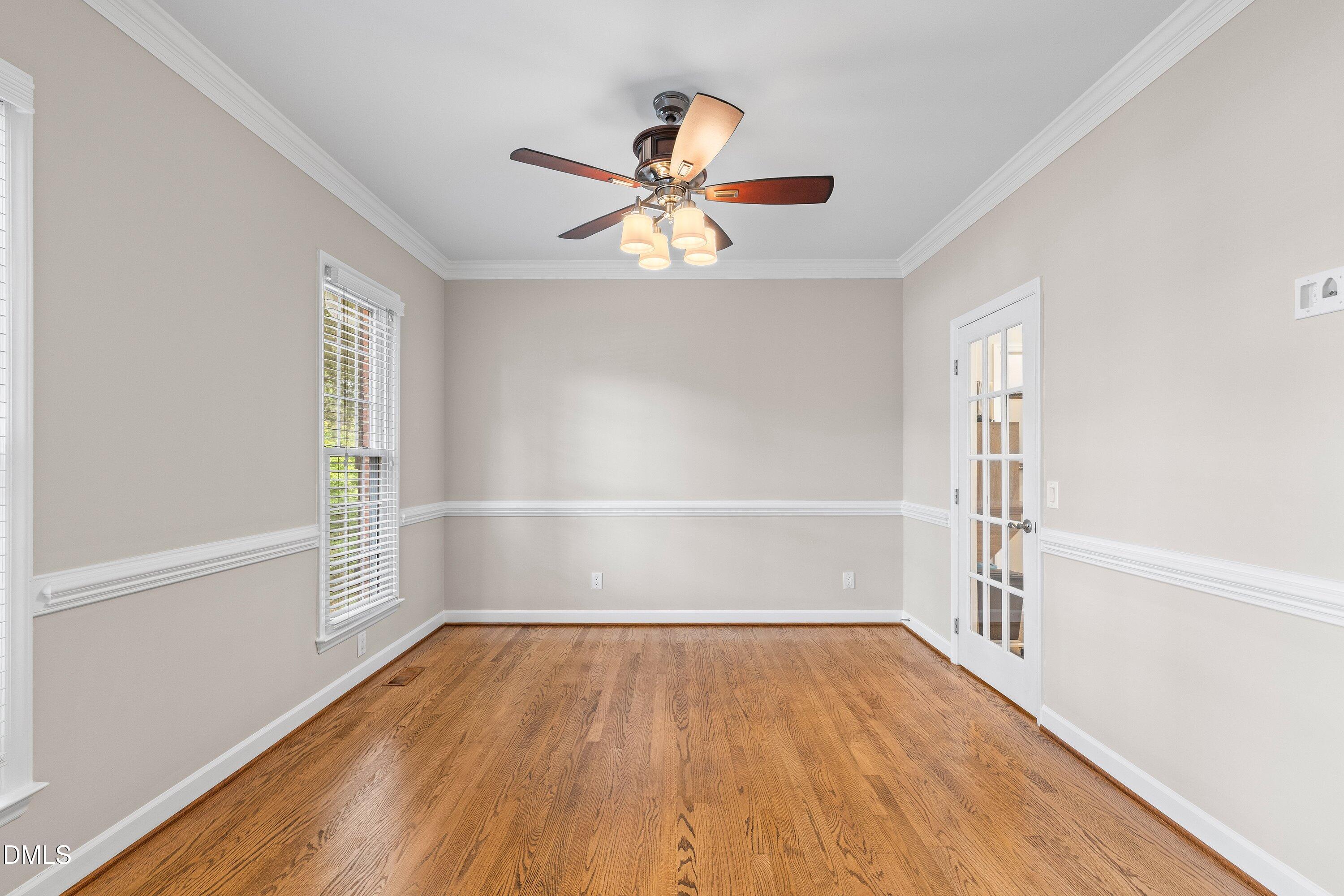 6612 Fowler Road Zebulon, NC 27597 - Photo 22 of 42 wooden floor in an empty room with a window