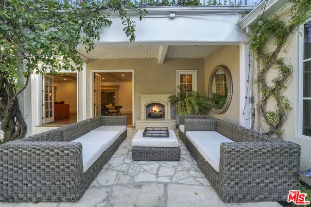 a front view of a house with outdoor space