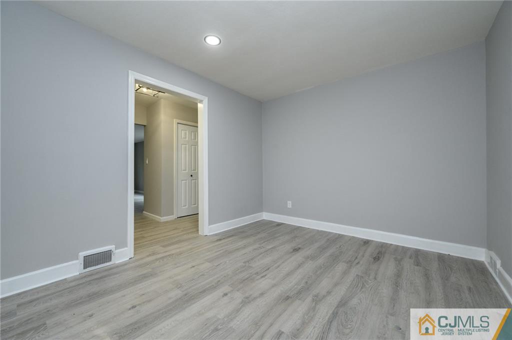 628 Concord Circle Ewing, NJ 08618 - Photo 13 of 48 an empty room with wooden floor and closet