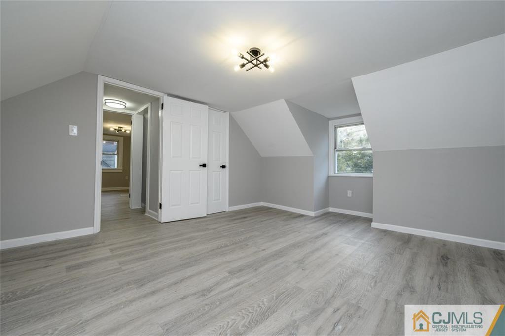 628 Concord Circle Ewing, NJ 08618 - Photo 33 of 48 an empty room with wooden floor and windows