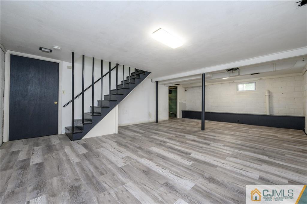 628 Concord Circle Ewing, NJ 08618 - Photo 41 of 48 a view of an empty room with wooden floor