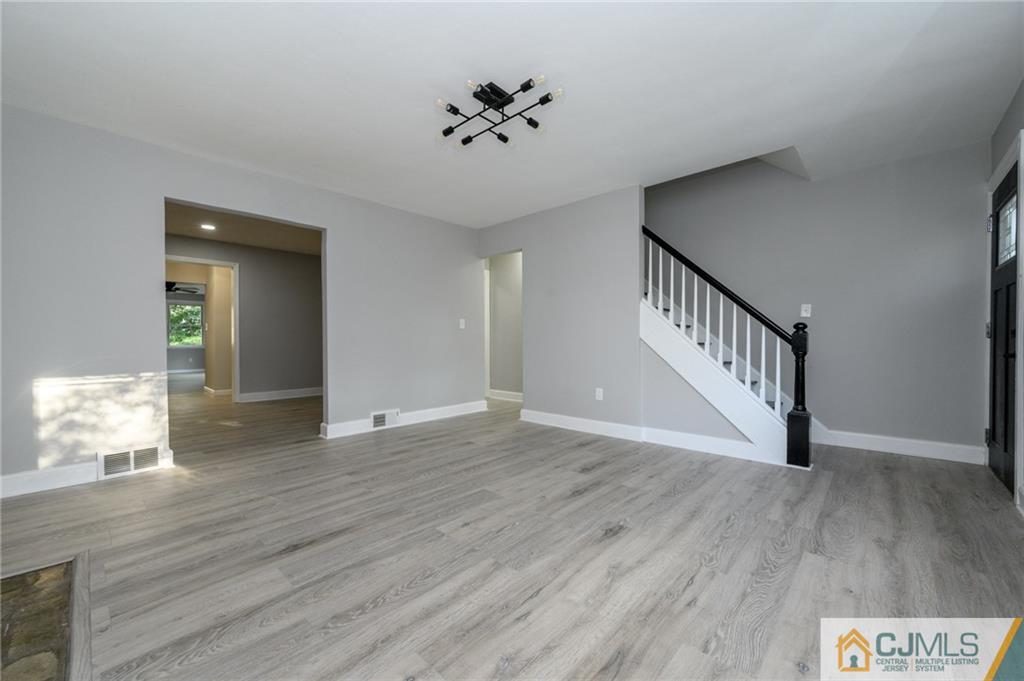 628 Concord Circle Ewing, NJ 08618 - Photo 7 of 48 wooden floor in an empty room with a window