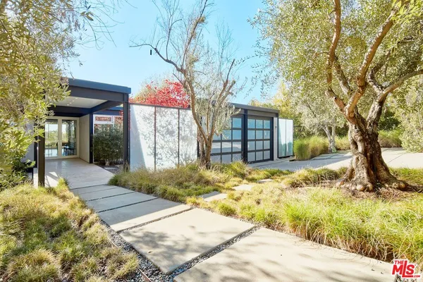 a view of house with yard