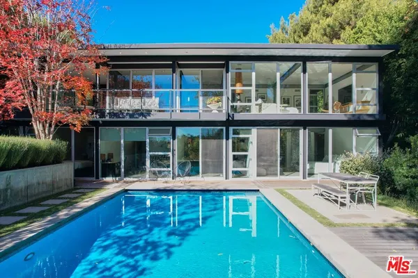 a view of a house with a swimming pool