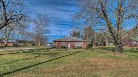 a outdoor space with trees in the background