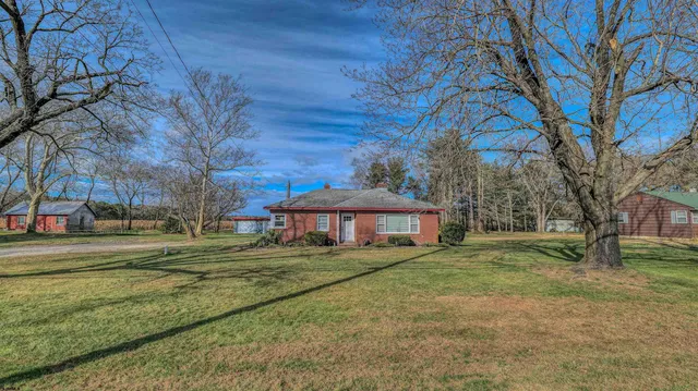a outdoor space with trees in the background