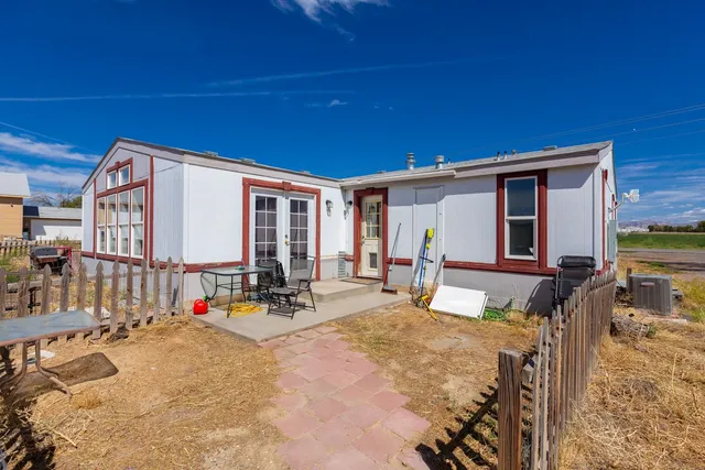 a front view of a house having yard