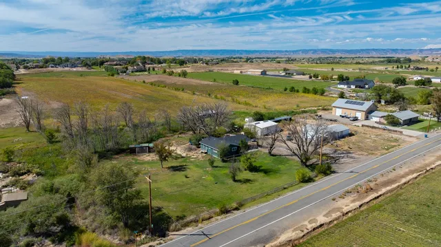 a view of a garden with an ocean