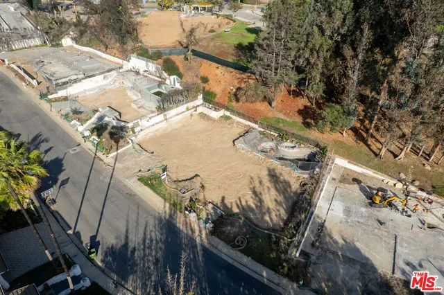 a view of a yard with an outdoor space