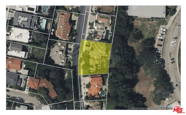 a picture of a room with a white wall and a large window