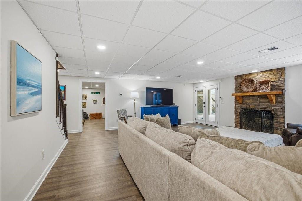 397 Thomas Road Dallas, GA 30132 - Photo 62 of 108 a living room with furniture and a fireplace