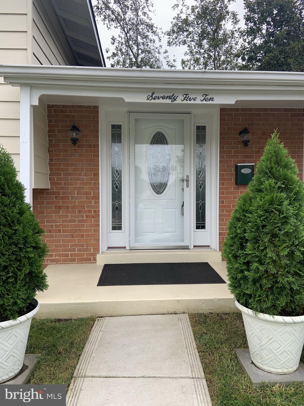 7510 Castle Road Manassas, VA 20109 - Photo 5 of 41 Updated front door highlighted by porch