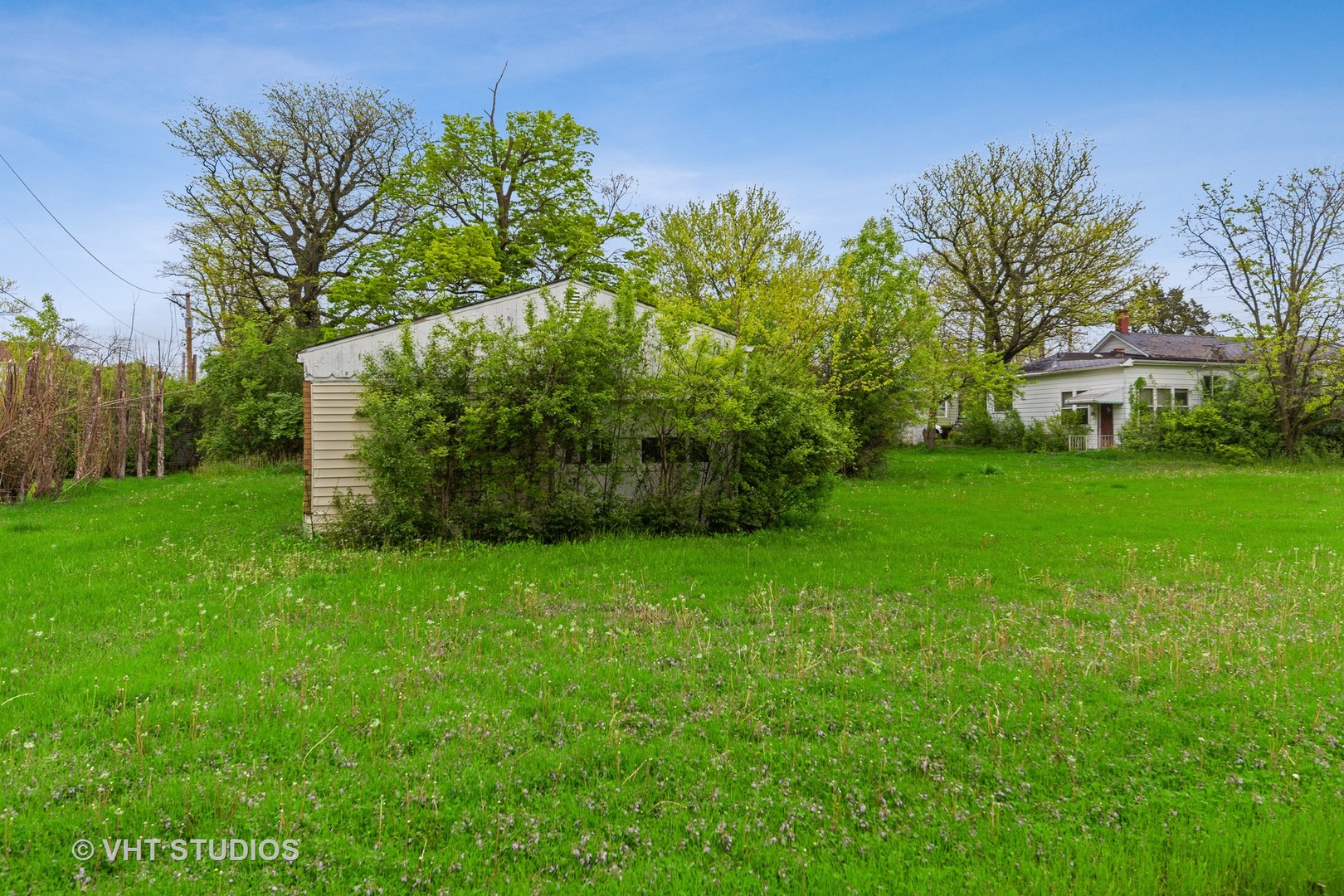 3610 York Road Oak Brook, IL 60523 - Photo 6 of 9 a view of a garden with a building in the background