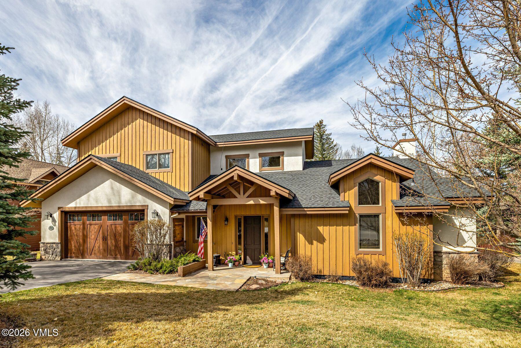 91 Creamery Trail Edwards, CO 81632 - Photo 1 of 44 a front view of a house with a yard