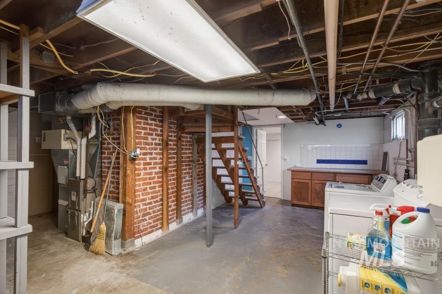 515 East D Street Moscow, ID 83843 - Photo 24 of 29 Unfinished basement with heating unit and washing machine and dryer