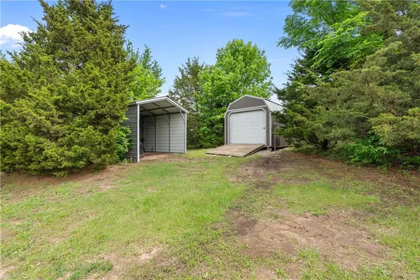 $550,000 | 584 Southeast 80th Road, Warrensburg, MO 64093