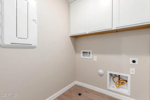 a view of a brick house with many windows