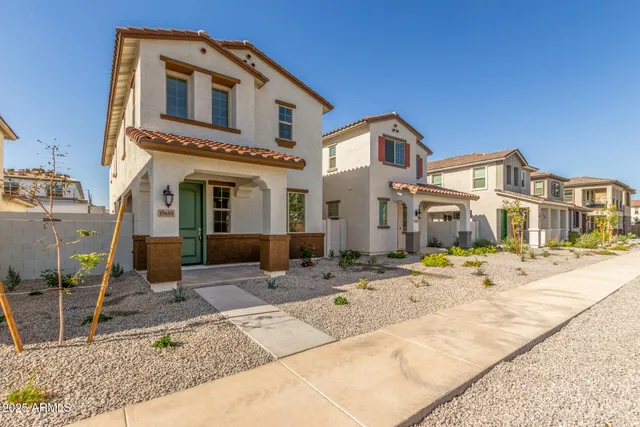 a front view of a house with patio