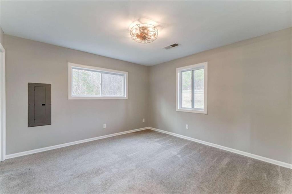 197 Colquitt Road Cedartown, GA 30125 - Photo 21 of 62 a view of empty room with windows