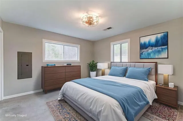 a bathroom with a toilet sink vanity tub and shower