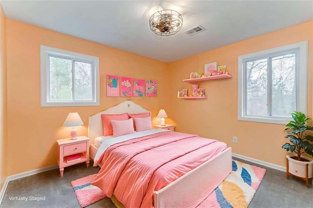 197 Colquitt Road Cedartown, GA 30125 - Photo 33 of 62 a bedroom with a bed and a window