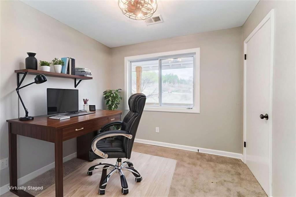 197 Colquitt Road Cedartown, GA 30125 - Photo 41 of 62 a view of a workspace with furniture and a window