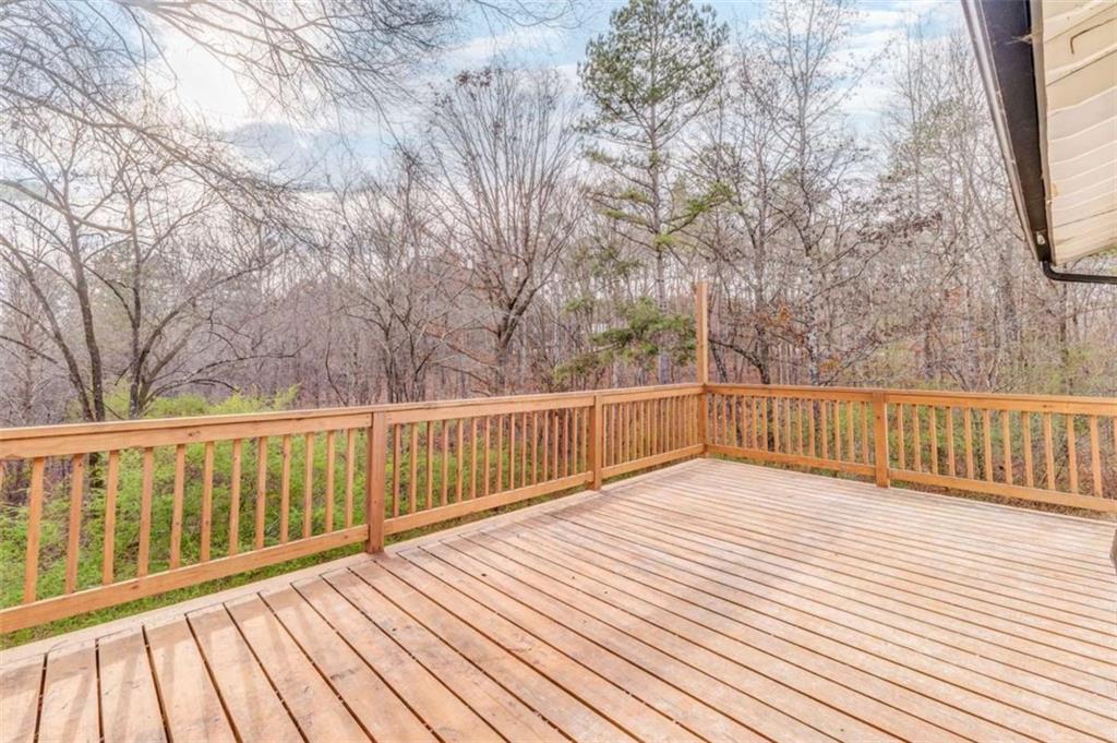 197 Colquitt Road Cedartown, GA 30125 - Photo 45 of 62 a view of deck with wooden floor and trees